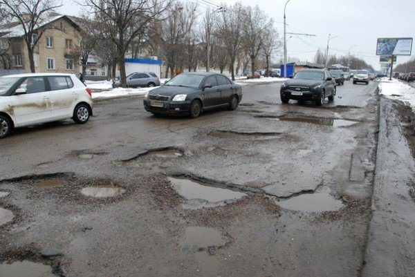 В Харьков пришла весна и вернулись разбитые дороги (фоторе..., фото-7 В Харьков пришла весна и вернулись разбитые дороги (фоторепортаж), фото-7