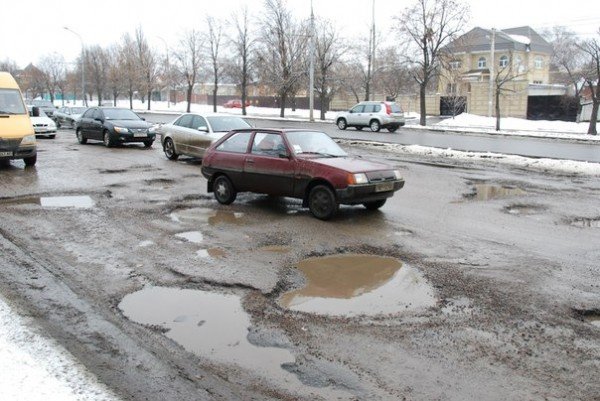 В Харьков пришла весна и вернулись разбитые дороги (фоторе..., фото-2 В Харьков пришла весна и вернулись разбитые дороги (фоторепортаж), фото-2