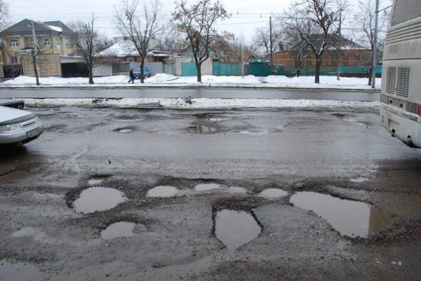 В Харьков пришла весна и вернулись разбитые дороги (фоторе..., фото-9 В Харьков пришла весна и вернулись разбитые дороги (фоторепортаж), фото-9