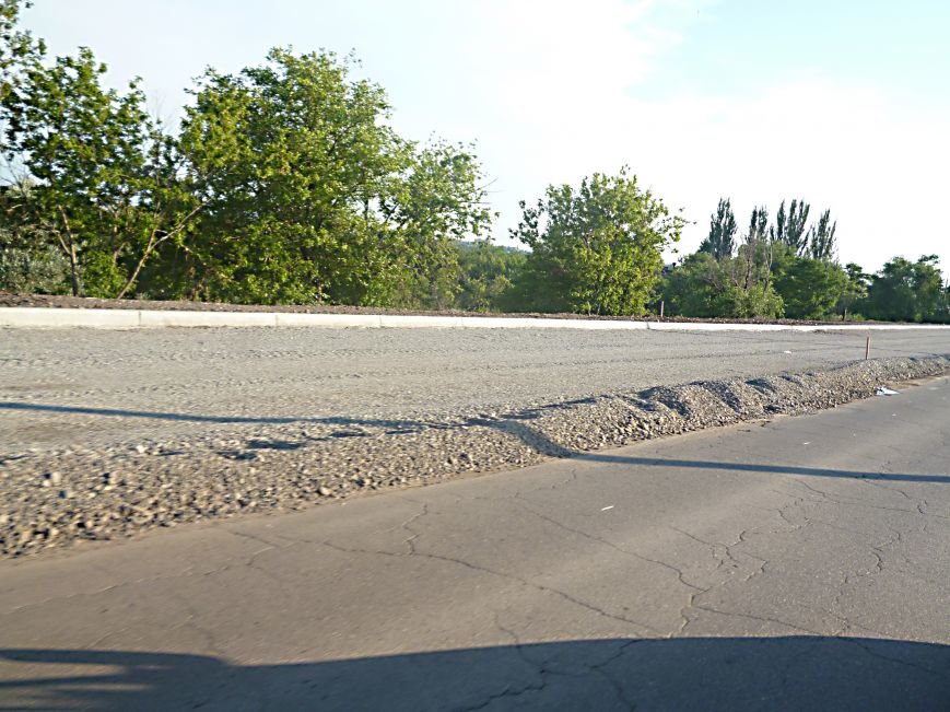 В Кривом Роге перекроют дорогу через дамбу на КРЭСе. Автотранспорт пустят по новой трассе (ФОТО) (фото) - фото 1 В Кривом Роге перекроют дорогу через дамбу на КРЭСе. Автотранспорт пустят по новой трассе (ФОТО) (фото) - фото 1
