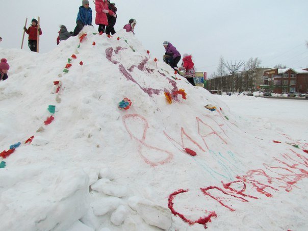 В Эжвинском районе столицы  на снегу "распустились" тюльпаны, фото-3